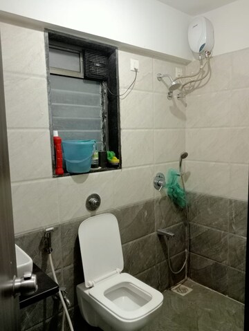 Bathroom in 2 BHK Apartment at Sethia Kalpavruksh Heights, Kandivali West – for Rent