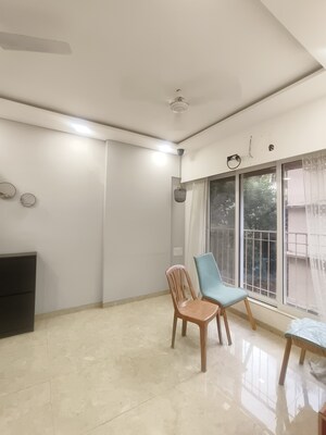 Living Room in 1 BHK Apartment at MDM Zion, Andheri West – for Sale