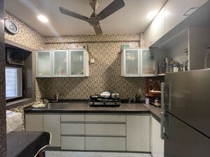 Living Room in 1 BHK Apartment at Versova Heaven CHS, Andheri West – for Sale