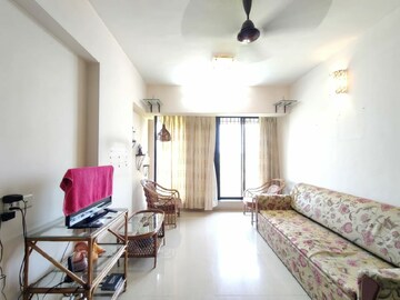 Living Room in 1 BHK Apartment at Miraj Residency, Malad West – for Rent