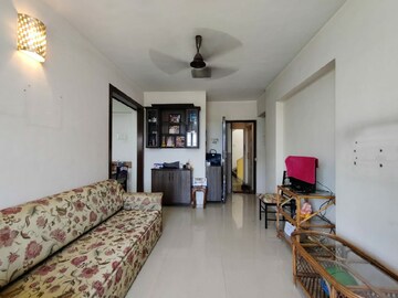Living Room in 1 BHK Apartment at Miraj Residency, Malad West – for Rent