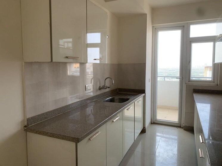 Kitchen, shapoorji-pallonji-joyville-gurgaon 3 Bedroom 1852 Sq.Ft. Apartment In Sector 102 Gurgaon 8884945