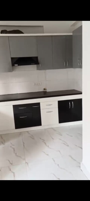 Kitchen in 3 BHK Apartment at Mahagun Mywoods, Sector 16c Greater Noida – for Rent