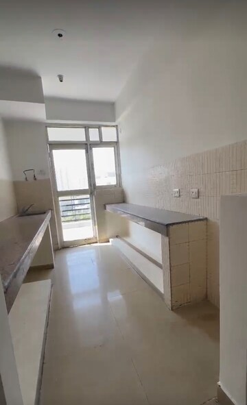 Kitchen in 2 BHK Apartment at GH-7 Crossings Republik, Vijay Nagar – for Rent