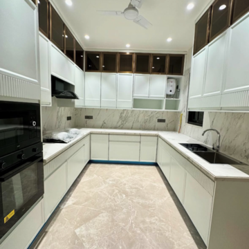 Kitchen in 4 BHK Apartment at Transcon Triumph Tower, Veera Desai Industrial Estate – for Sale