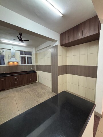Kitchen in 4 BHK Apartment at AWHO Sandeep Vihar, Whitefield – for Rent