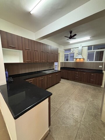 Kitchen in 4 BHK Apartment at AWHO Sandeep Vihar, Whitefield – for Rent