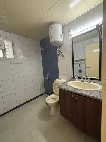 Bathroom in 4 BHK Apartment at AWHO Sandeep Vihar, Whitefield – for Rent
