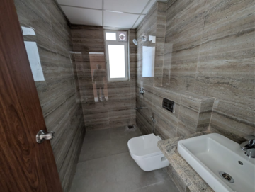 Bathroom in 3 BHK Apartment at Runwal Nirvana, Dhabholkar Wadi – for Rent