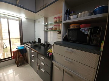 Kitchen in 2 BHK Apartment at Serenity CHS Ltd, Mira Road – for Sale