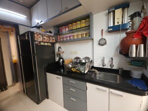 Kitchen in 2 BHK Apartment at Serenity CHS Ltd, Mira Road – for Sale