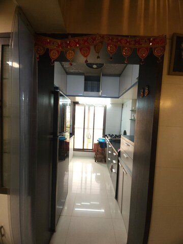 Kitchen in 2 BHK Apartment at Serenity CHS Ltd, Mira Road – for Sale