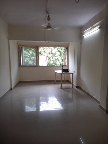 Living Room in 1 BHK Apartment at United Unity Heights, Malad West – for Rent