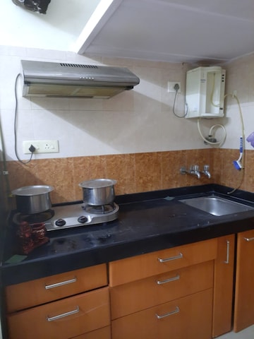 Kitchen in 1 BHK Apartment at United Unity Heights, Malad West – for Rent