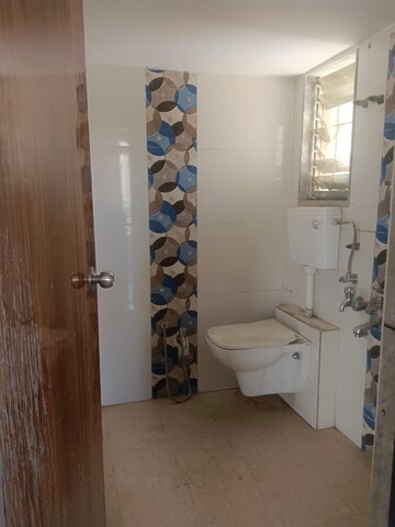 Bathroom in 1 BHK Apartment at Seven Eleven Apna Ghar, Mira Road – for Rent