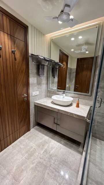 Bathroom in 3 BHK Apartment at Defence Colony – for Rent