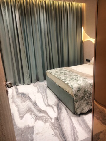 Bedroom in 2 BHK Apartment at K Raheja Heights, Malad East – for Rent