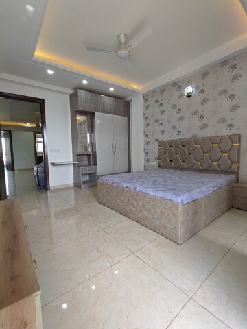 Bedroom in 3 BHK Builder Floor at Ansal Sushant Lok I, Sector 43 – for Rent