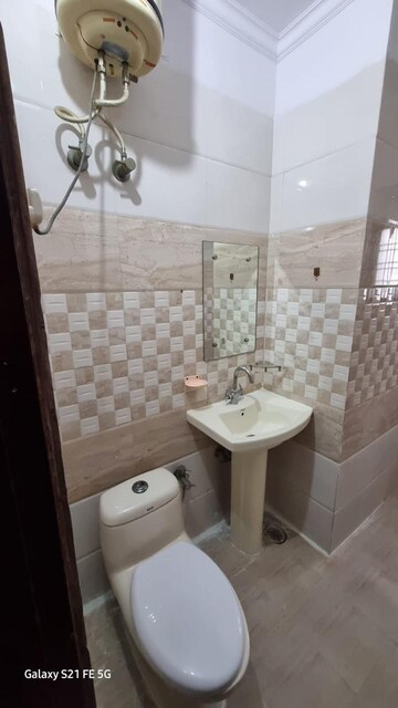 Bathroom in 1 BHK Builder Floor at Ansal Sushant Lok I, Sector 43 – for Rent