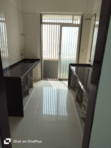Kitchen in 2 BHK Apartment at Shreeji Atlantis, Malad West – for Rent
