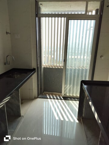 Kitchen in 2 BHK Apartment at Shreeji Atlantis, Malad West – for Rent