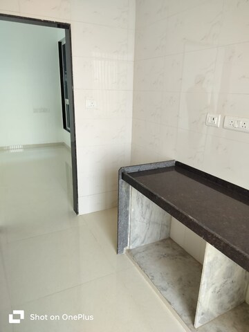 Kitchen in 2 BHK Apartment at Shreeji Atlantis, Malad West – for Rent