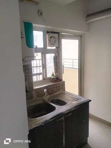 Kitchen in 3 BHK Apartment at Nimbus The Hyde park, Sector 78 – for Rent