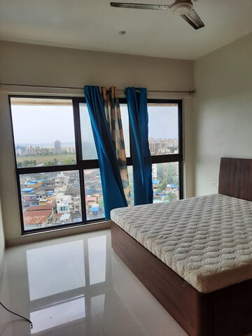 Bedroom in 2 BHK Apartment at Rustomjee Meridian, Kandivali West – for Rent