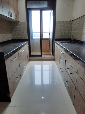 Kitchen in 2 BHK Apartment at Rustomjee Meridian, Kandivali West – for Rent