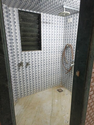 Bathroom in 1 BHK Apartment at Kalpak Tower CHS, Dombivli West – for Rent