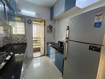 Kitchen in 2.5 BHK Apartment at Sudarshan Sky Garden, Ghodbunder Road – for Rent