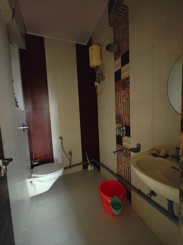 Bathroom in 3 BHK Apartment at Seawoods Sector 50 – for Rent