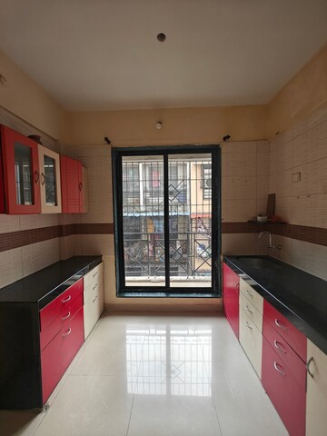 Kitchen in 2 BHK Apartment at Shiv Kalash Apartment, Seawoods – for Rent