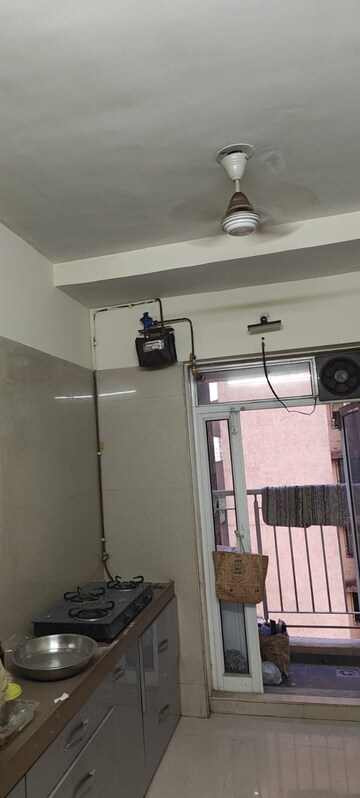Kitchen in 2.5 BHK Apartment at Dosti Group Imperia, Manpada – for Rent