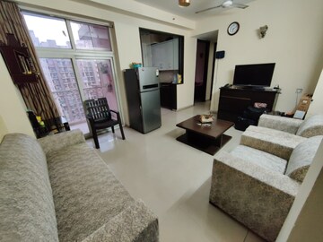 Living Room in 2 BHK Apartment at Amrapali Dream Valley, Tech Zone 4 Greater Noida – for Rent