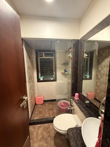 Bathroom in 3 BHK Apartment at Rustomjee OZone, Goregaon West – for Rent