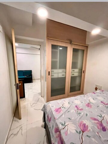 Bedroom in 2 BHK Apartment at Satellite Garden, Goregaon East – for Rent