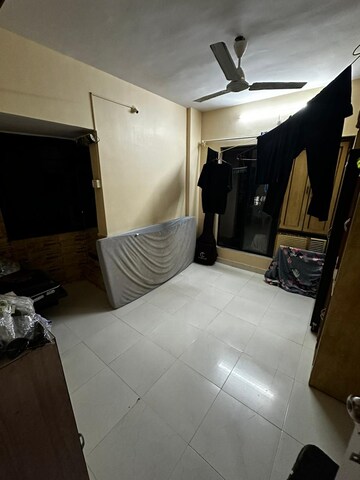 Master Bedroom in 1 BHK Apartment at Divya Stuti CHS, Goregaon East – for Rent