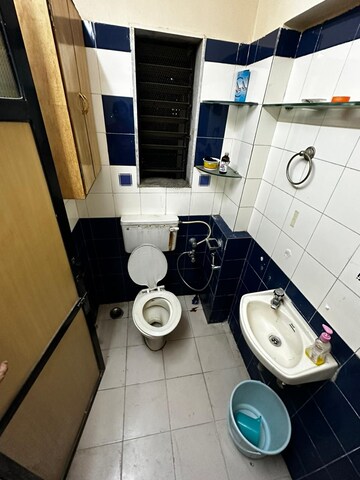Master Bedroom in 1 BHK Apartment at Divya Stuti CHS, Goregaon East – for Rent
