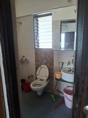 Bathroom in 2 BHK Apartment at Sudarshan Sky Garden, Ghodbunder Road – for Sale