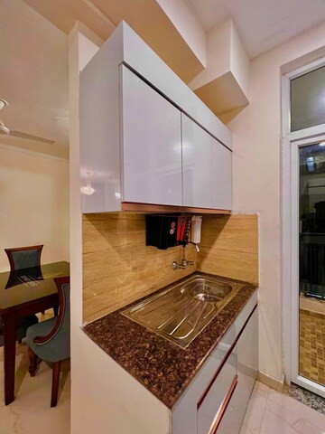 Kitchen in 2 BHK Apartment at Urban Axis Urban Woods, Sushant Golf City – for Rent