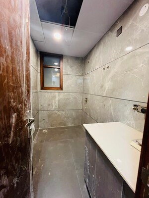 Bathroom in 4 BHK Builder Floor at Green Fields Colony – for Sale