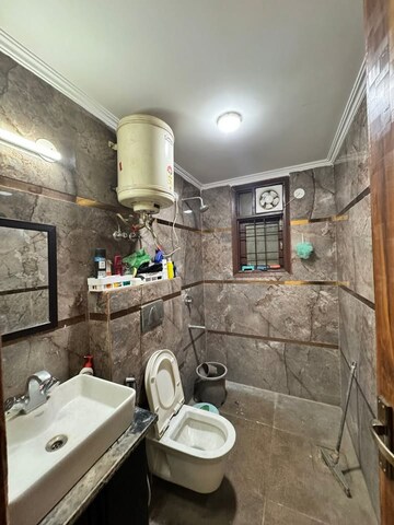 Bathroom in 2 BHK Builder Floor at Chattarpur – for Rent