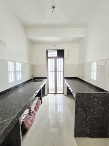 Kitchen in 2 BHK Apartment at Runwal My City Phase II Cluster 05, Dombivli East – for Rent