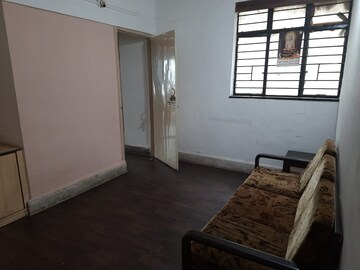 Living Room in 1 BHK Apartment at Vanaz Corner, Kothrud – for Rent