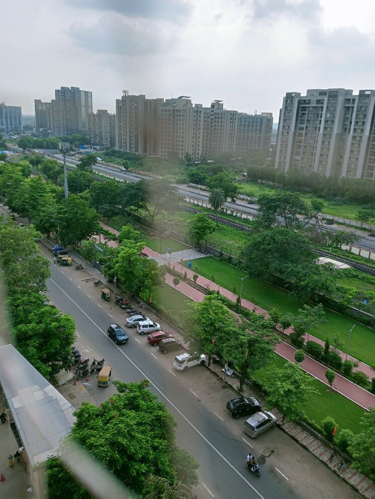 Garden, poddar-palm-greens 2 Bedroom 1064 Sq.Ft. Apartment In Makarba Ahmedabad 8888967