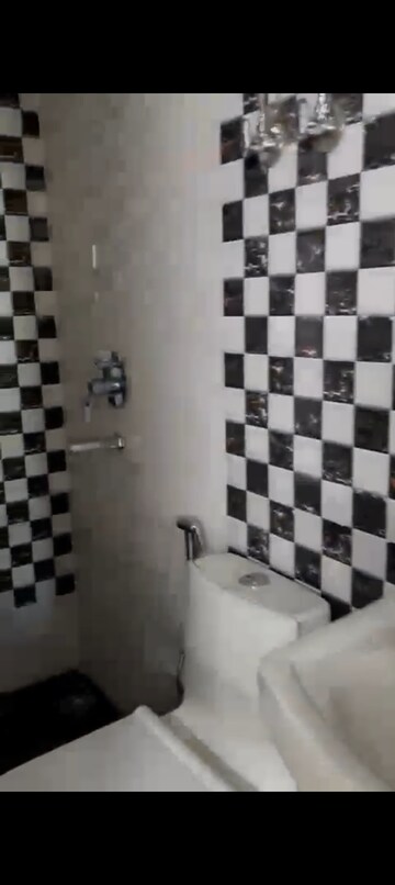 Bathroom in 3 BHK Apartment at Migsun Roof, Raj Nagar Extension – for Rent