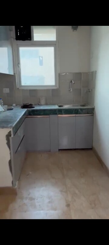 Kitchen in 3 BHK Apartment at Migsun Roof, Raj Nagar Extension – for Rent