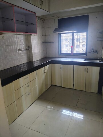 Kitchen in 1 BHK Apartment at Bhumiraj Woods, Kharghar – for Sale