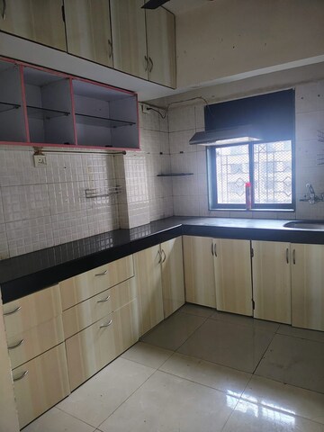 Kitchen in 1 BHK Apartment at Bhumiraj Woods, Kharghar – for Sale